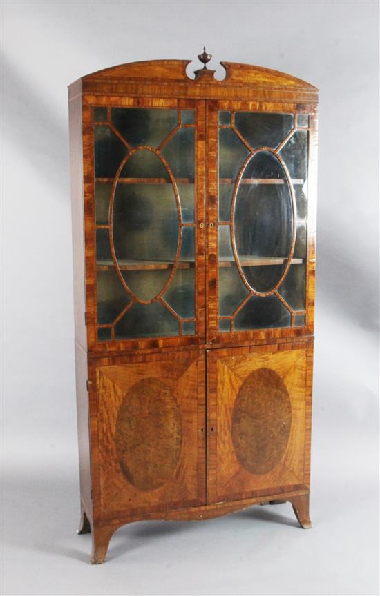 A late George III Sheraton style satinwood and burr wood bookcase, W.2ft 9in. D.10in. H.5ft 9.5in.